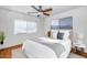 Bedroom with a queen-size bed and ceiling fan at 6730 W Vernon Ave, Phoenix, AZ 85035