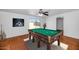 Game room featuring a pool table and wood flooring at 6730 W Vernon Ave, Phoenix, AZ 85035