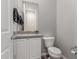 Simple bathroom with a toilet and single vanity at 7214 W Buckhorn Trl, Peoria, AZ 85383