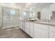 Elegant bathroom with marble shower and double vanity at 7214 W Buckhorn Trl, Peoria, AZ 85383