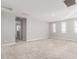 Spacious bedroom with carpeting and access to a bathroom at 7214 W Buckhorn Trl, Peoria, AZ 85383