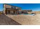 New home with a newly built pool in the backyard at 7214 W Buckhorn Trl, Peoria, AZ 85383