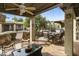 Outdoor patio with seating and dining areas at 7737 E Columbine Way, Mesa, AZ 85208