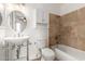 Clean bathroom, featuring a tub, toilet and pedestal sink at 7910 E Thomas Rd # 118, Scottsdale, AZ 85251