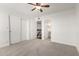 Bright bedroom with ceiling fan, large closet, and ensuite bathroom at 7910 E Thomas Rd # 118, Scottsdale, AZ 85251