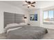 Bright bedroom with a king-size bed and large window at 7910 E Thomas Rd # 118, Scottsdale, AZ 85251