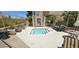 Secluded hot tub with stone accents, lounge seating, and a tranquil fountain feature at 7910 E Thomas Rd # 118, Scottsdale, AZ 85251