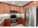 Modern kitchen with stainless steel appliances and granite countertops at 7910 E Thomas Rd # 118, Scottsdale, AZ 85251