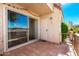 Private patio with sliding glass doors and lovely views at 7910 E Thomas Rd # 118, Scottsdale, AZ 85251