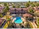 Aerial view of community featuring pool, spa, and residential buildings at 7920 E Arlington Rd # 2, Scottsdale, AZ 85250