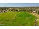 Aerial view of a large grassy field with soccer goals and sprinklers at 7920 E Arlington Rd # 2, Scottsdale, AZ 85250