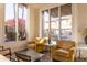 Bright and airy common area with comfortable seating and large windows at 7920 E Arlington Rd # 2, Scottsdale, AZ 85250