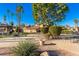 Outdoor patio area with tables and chairs, surrounded by landscaping at 7920 E Arlington Rd # 2, Scottsdale, AZ 85250