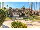 Community patio area with seating and landscaping near a pool at 7920 E Arlington Rd # 2, Scottsdale, AZ 85250