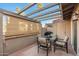 Private patio with pergola, seating, and grill at 7920 E Arlington Rd # 2, Scottsdale, AZ 85250