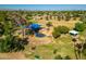 Community playground with play structures at 7920 E Arlington Rd # 2, Scottsdale, AZ 85250