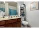 Clean bathroom with a single sink, shower, and storage at 846 N Pueblo Dr # 104, Casa Grande, AZ 85122