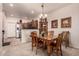 Bright dining area with a wooden table and chairs at 846 N Pueblo Dr # 104, Casa Grande, AZ 85122