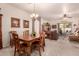 Dining room with view into the kitchen and living room at 846 N Pueblo Dr # 104, Casa Grande, AZ 85122