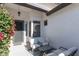 Front patio with seating area and bougainvillea at 862 E Gemini Pl, Chandler, AZ 85249