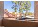 View of community from balcony, showing parking and landscaping at 8787 E Mountain View Rd # 2101, Scottsdale, AZ 85258