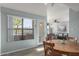 Dining area with view of patio and living room at 8787 E Mountain View Rd # 2101, Scottsdale, AZ 85258