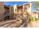 Condo building exterior showing multiple units and walkways at 8787 E Mountain View Rd # 2101, Scottsdale, AZ 85258