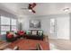 Living room with leather couches and large window at 8787 E Mountain View Rd # 2101, Scottsdale, AZ 85258