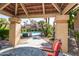 Relaxing covered patio area overlooking the pool at 8787 E Mountain View Rd # 2101, Scottsdale, AZ 85258