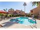 Inviting community pool with spa and comfortable seating at 8787 E Mountain View Rd # 2101, Scottsdale, AZ 85258