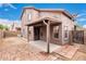 Two-story house with covered patio, small backyard, and block wall at 8802 E University Dr # 66, Mesa, AZ 85207