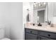 Modern bathroom with gray vanity, quartz countertop, and updated fixtures at 8802 E University Dr # 66, Mesa, AZ 85207