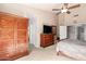 Spacious bedroom with wooden furniture and a large closet at 8833 W Tierra Buena Ln, Peoria, AZ 85382