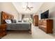 Main bedroom with a ceiling fan and ample closet space at 8833 W Tierra Buena Ln, Peoria, AZ 85382