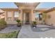 Front entry with decorative door and stone pathway at 8833 W Tierra Buena Ln, Peoria, AZ 85382