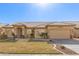 One-story home with tan exterior, tile roof, and landscaped yard at 8833 W Tierra Buena Ln, Peoria, AZ 85382