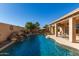 Relaxing pool area with waterfall and patio seating at 8833 W Tierra Buena Ln, Peoria, AZ 85382