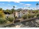 Aerial view of a luxurious home with a large yard and gated entrance at 8915 N Invergordon Rd, Paradise Valley, AZ 85253