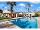 Refreshing pool with diving board, surrounded by lush landscaping at 8915 N Invergordon Rd, Paradise Valley, AZ 85253