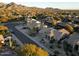 Aerial view of a residential neighborhood with mountain views at 9439 E Palm Tree Dr, Scottsdale, AZ 85255