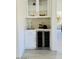Wet bar area with wine fridge and sink at 9439 E Palm Tree Dr, Scottsdale, AZ 85255
