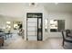 Modern entryway with stylish door and natural light at 9439 E Palm Tree Dr, Scottsdale, AZ 85255