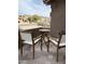 Cozy patio with seating, perfect for enjoying neighborhood views and the Arizona weather at 9439 E Palm Tree Dr, Scottsdale, AZ 85255