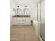 Bathroom featuring double sinks, granite counters, tub, and glass shower at 9970 E Monte Cristo Ave, Scottsdale, AZ 85260