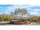 Welcoming entrance to Horseman's Park with stone signage, mature trees, and mountain views, creating an inviting atmosphere at 9970 E Monte Cristo Ave, Scottsdale, AZ 85260