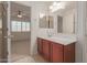 Bathroom with double vanity and mirror at 10325 W Windsor Ave, Avondale, AZ 85392