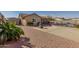 Large backyard with paved patio, pool, and storage shed at 10334 W Sunbird Dr, Arizona City, AZ 85123