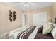 Bright bedroom with double door closet and decorative wall art at 10334 W Sunbird Dr, Arizona City, AZ 85123