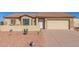 One-story home with a two-car garage and desert landscaping at 10334 W Sunbird Dr, Arizona City, AZ 85123