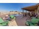 Inviting kidney shaped pool with patio seating at 10334 W Sunbird Dr, Arizona City, AZ 85123